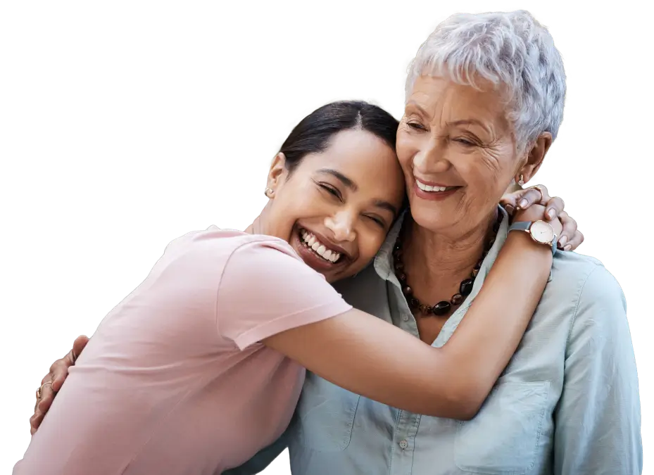 Elderly mother and adult daughter hugging, showing the peace of mind provided by Senior Care Authority advisors.