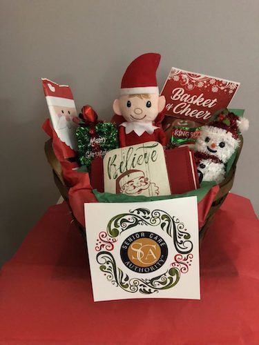 Mark Wolff and his family of elves surprise local seniors with cheer baskets